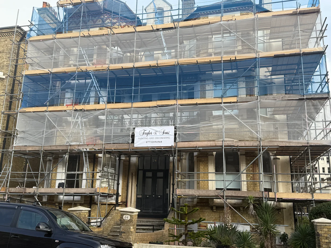 Full building scaffolded for the exterior decorating project